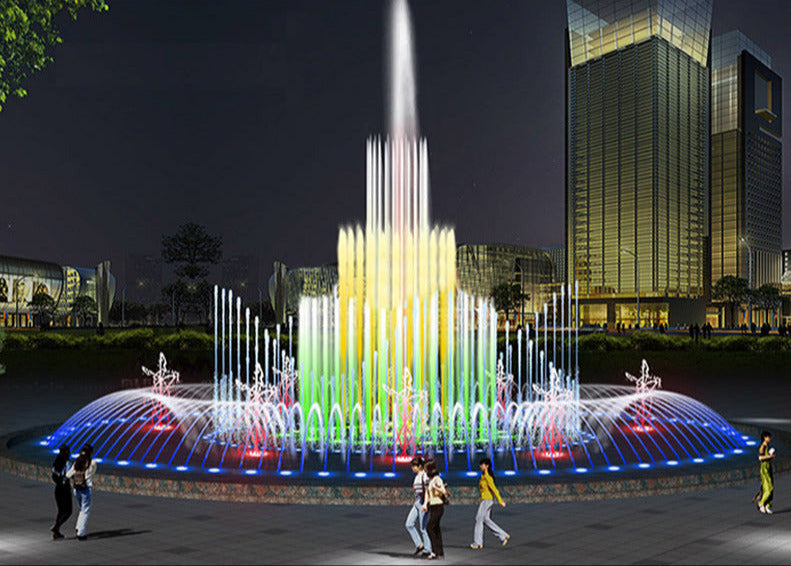 Colorful fountain show in an urban setting with tall buildings in the background &ndash; HuiQi Fountain
